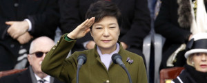 South Korea's new President Park Geun-hye salutes during her inauguration ceremony as the 18th South Korean president, at the National Assembly in Seoul, South Korea, Monday, Feb. 25, 2013. Park took office as South Korea's first female president Monday, returning to the presidential mansion she had known as the daughter of a dictator, and where she will respond to volatile North Korea, which tested a nuclear device two weeks ago. (AP Photo/Lee Jin-man)