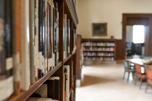 Selective Focus Photography of Bookshelf With Books - rural school