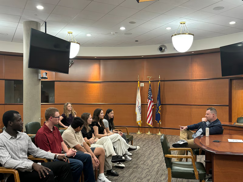 Dauphin County Commissioner Justin Douglas meets with college and high school students participating in the summer internship and enrichment program of the World Affairs Council of Harrisburg and PennLive.