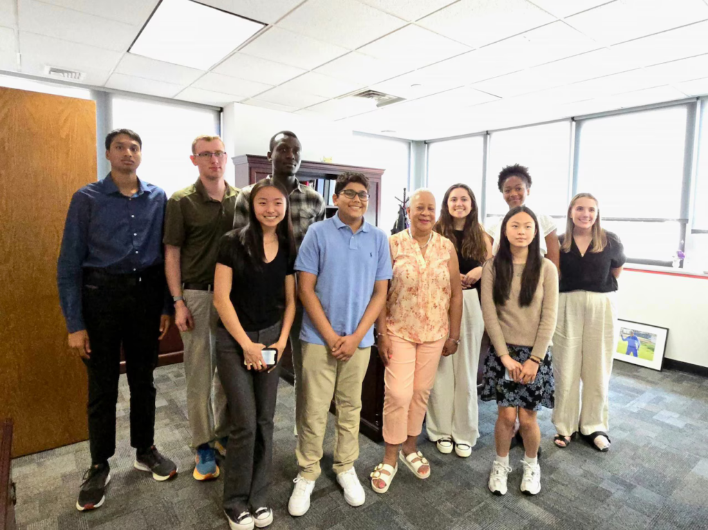 High school and college interns with Harrisburg Mayor Wanda Williams in her chambers during a visit in June 2024.